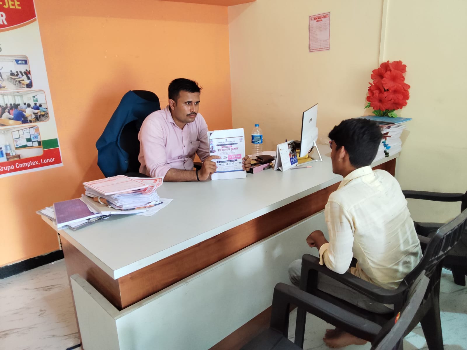 A student receiving individual admission and course counselling at Khadkeshwar NEET-JEE Academy, Lonar.