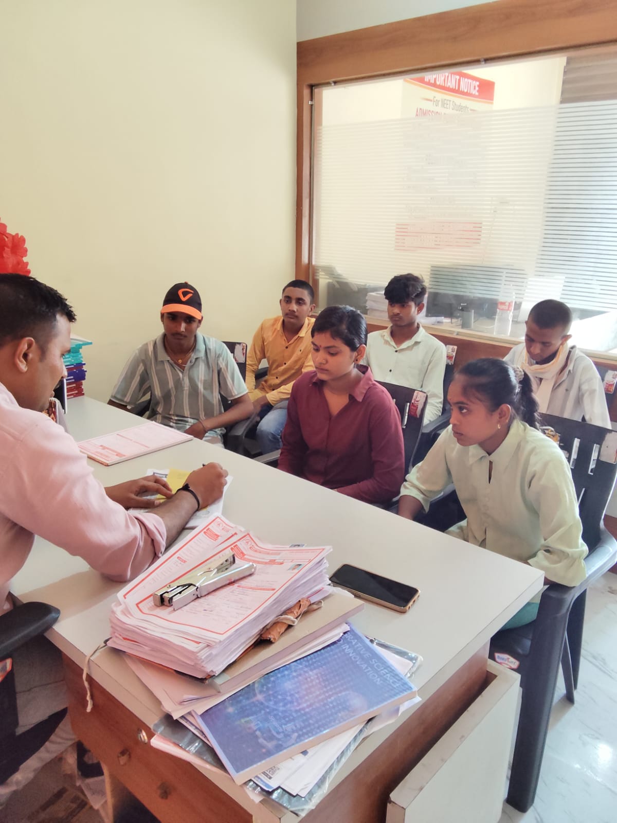 Students receiving detailed NEET-JEE admission and academic guidance during a counselling meeting at Khadkeshwar NEET-JEE Academy, Lonar.