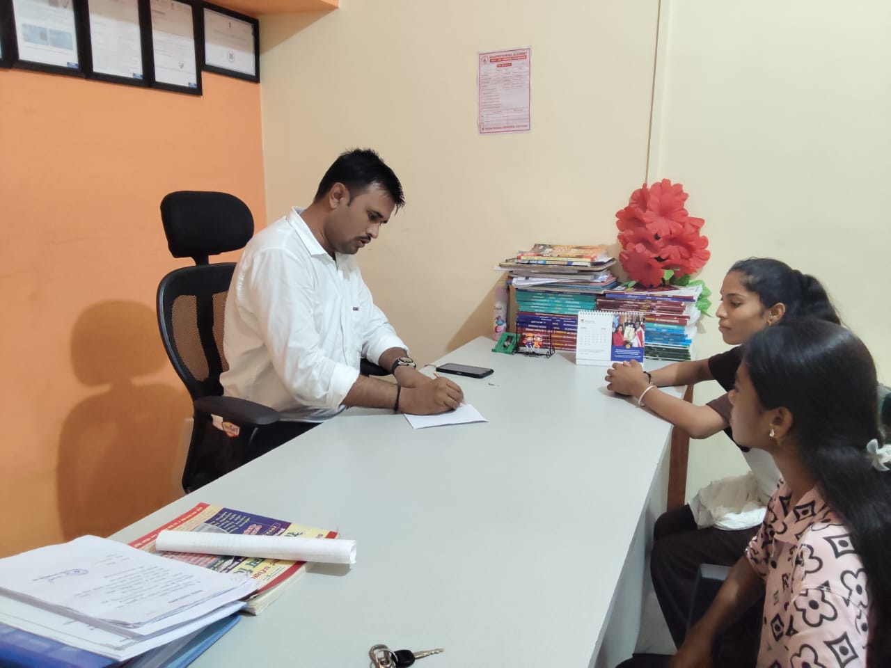 Students receiving personalised academic counselling and mentoring from faculty at Khadkeshwar NEET-JEE Academy, Lonar.